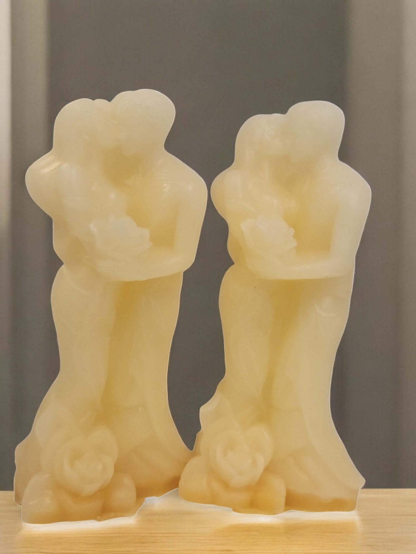 Couple cake candles featuring two embracing figures, perfect for enhancing intimacy and sensual experiences.