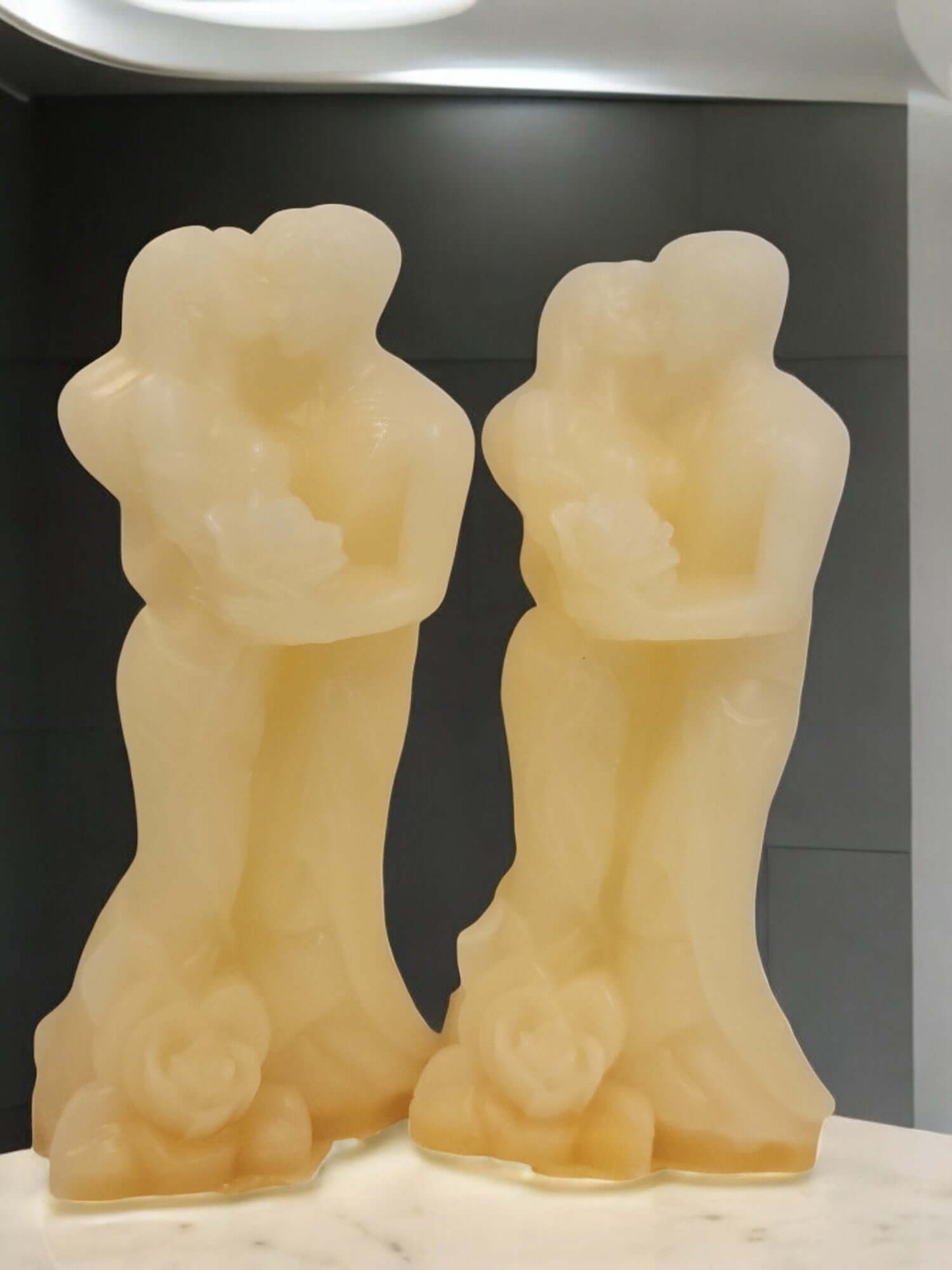 Sensual couple candles in a heartfelt embrace, perfect for enhancing intimacy and romantic moments.