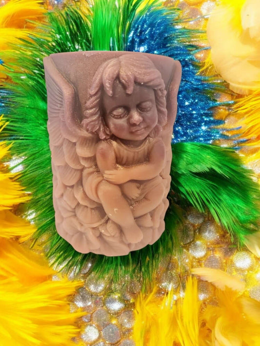 Angel Wing massage candle with a cherub figure, surrounded by colorful feathers, enhancing intimacy for couples.