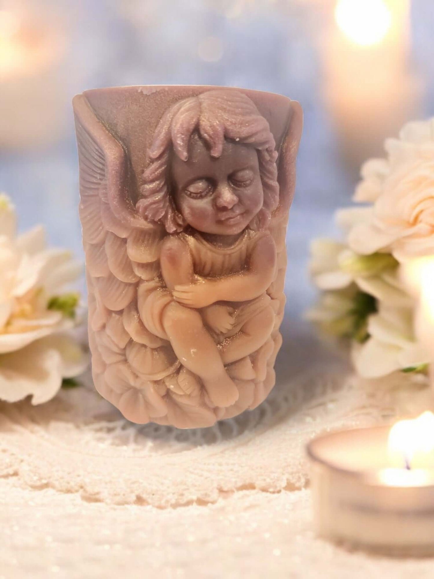 Angel Wing massage candle with intricate angel design, perfect for sensual play and relaxation.